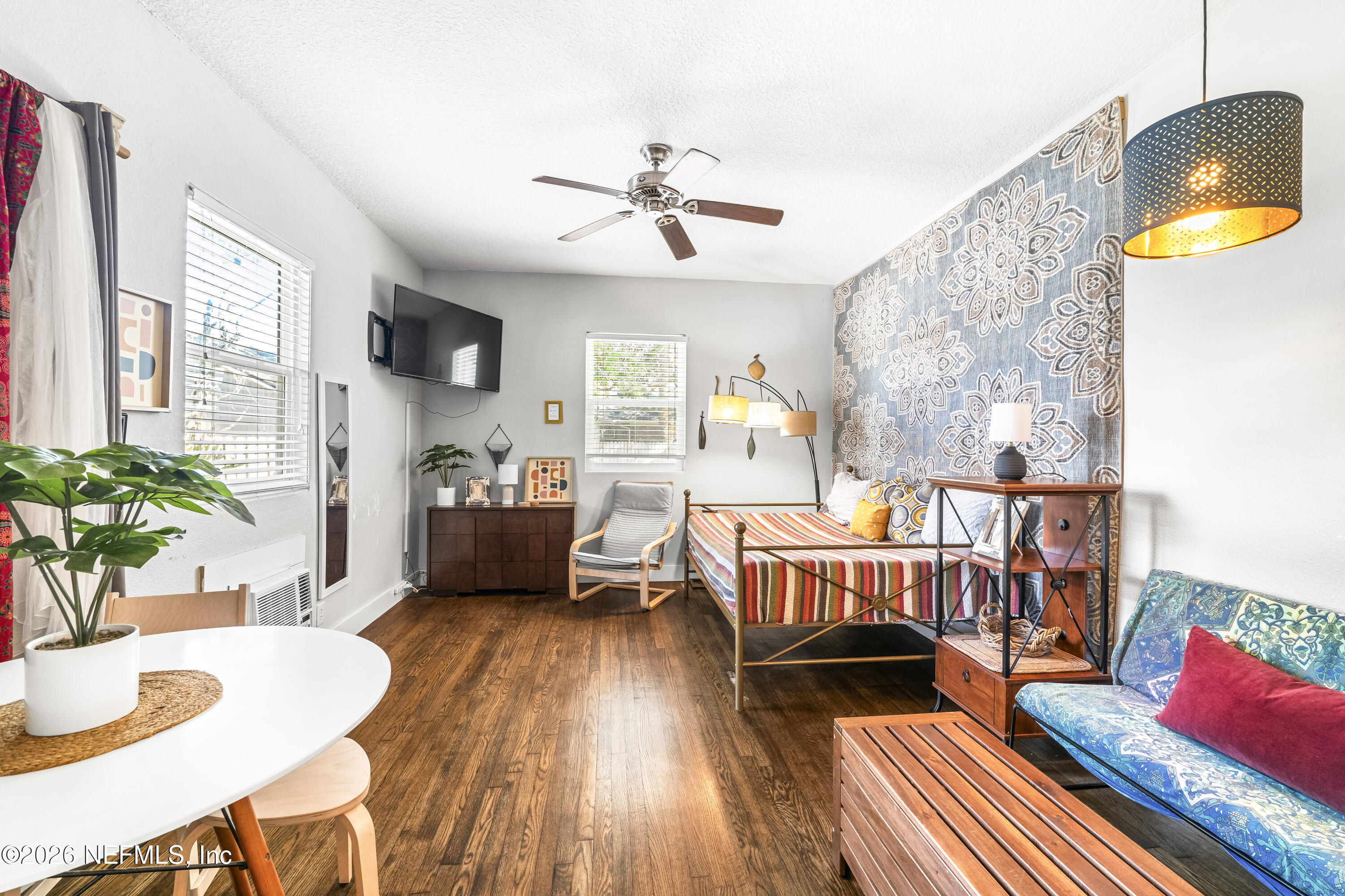 909 Cedar Street Jacksonville, FL 32207 - Photo 21 of 41 a living room with furniture and a wooden floor