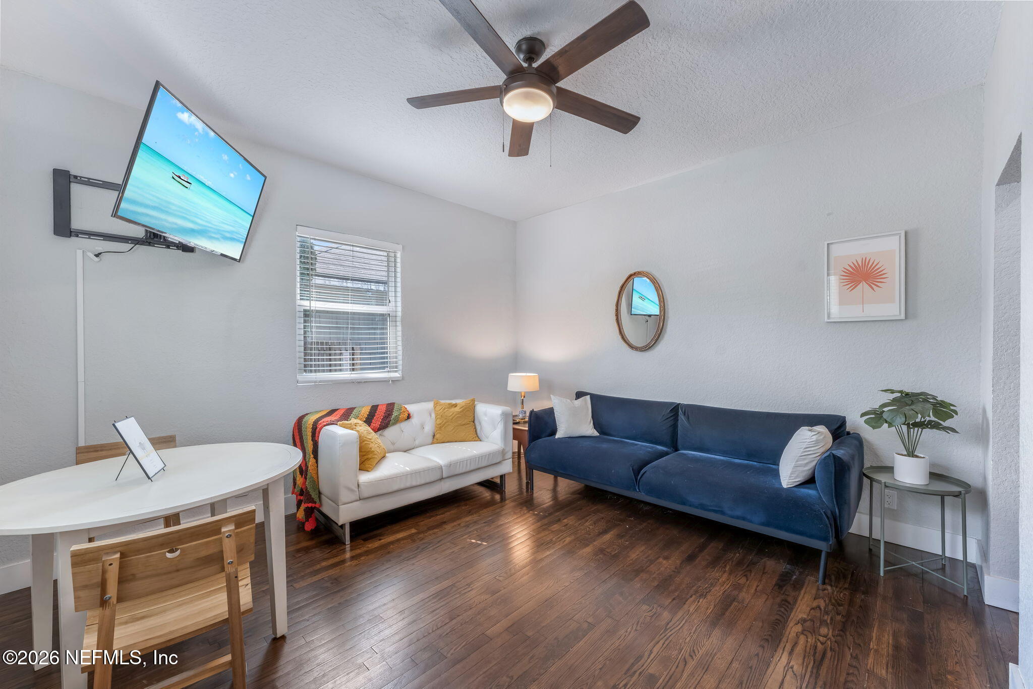 909 Cedar Street Jacksonville, FL 32207 - Photo 5 of 41 a living room with furniture and a wooden floor