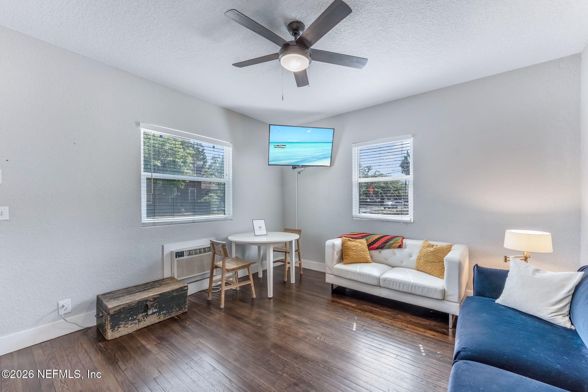 909 Cedar Street Jacksonville, FL 32207 - Photo 6 of 41 a living room with furniture and a wooden floor