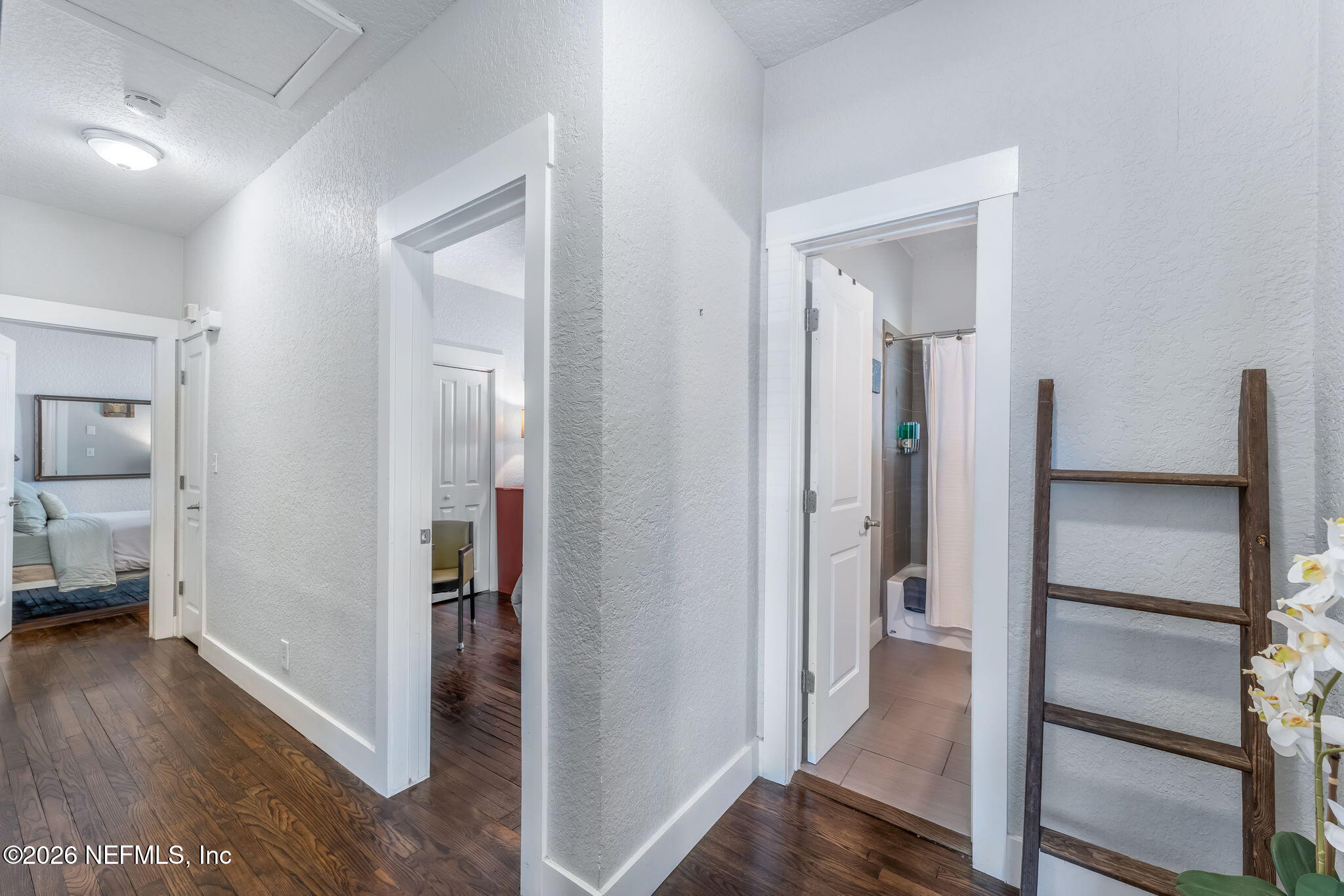 909 Cedar Street Jacksonville, FL 32207 - Photo 9 of 41 a view of a hallway with a livingroom and a livingroom with furniture