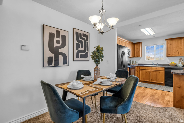 1136 West Spencer Road, Unit Y203 Pleasant Grove, UT 84062 - Photo 11 of 26 Dining room with suspended lighting and light wood-type flooring