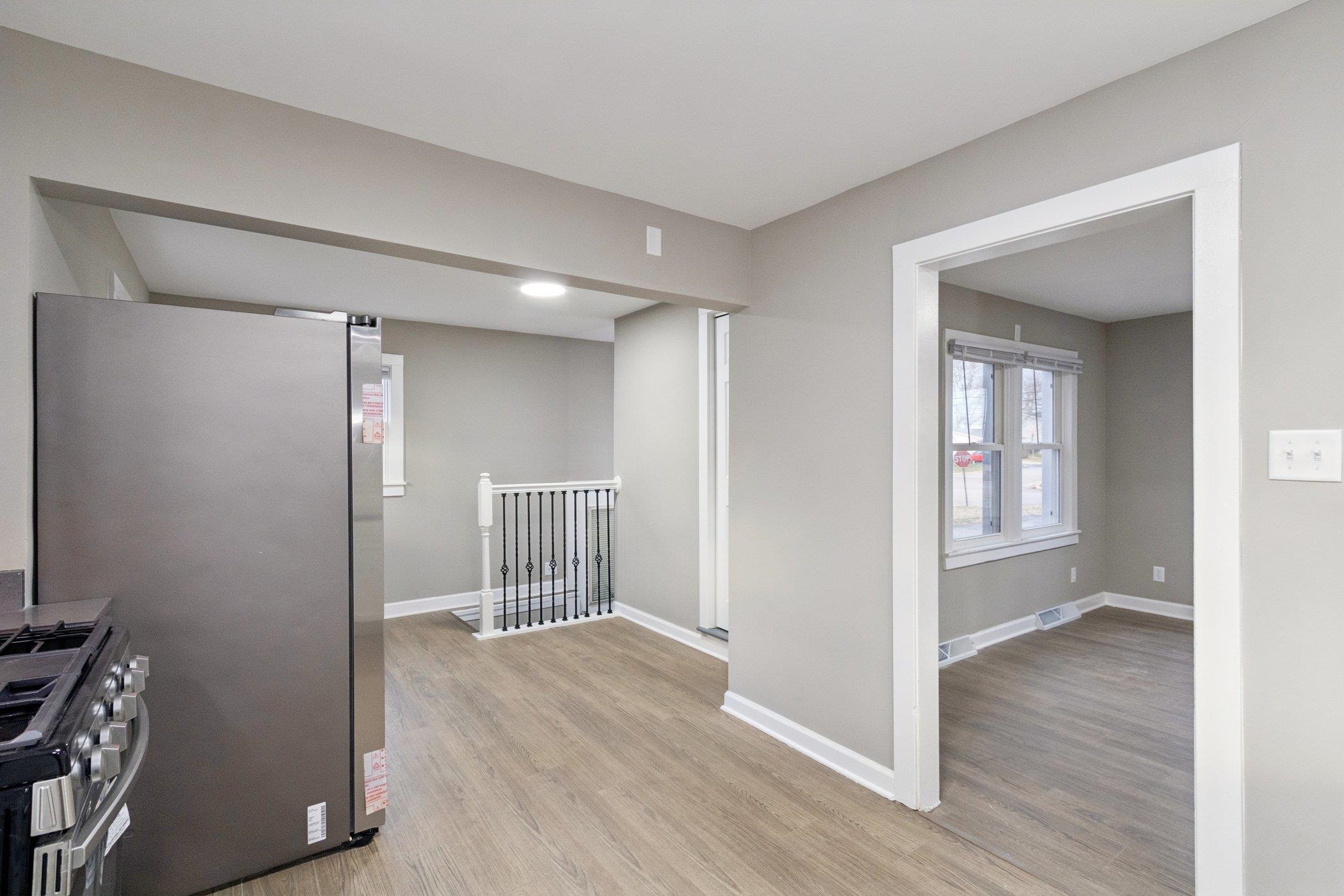 519 South Sycamore Street Genoa, IL 60135 - Photo 12 of 36 a view of entryway with wooden floor