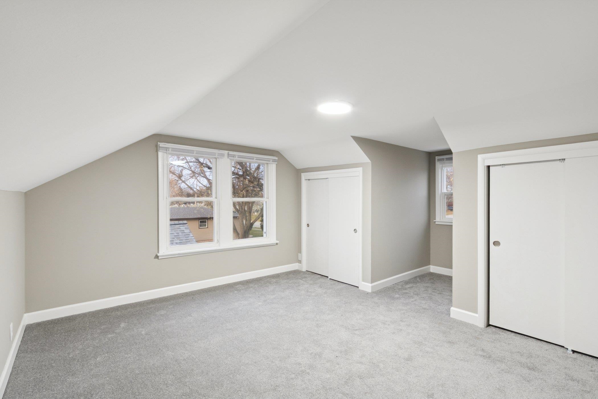 519 South Sycamore Street Genoa, IL 60135 - Photo 24 of 36 an empty room with a window