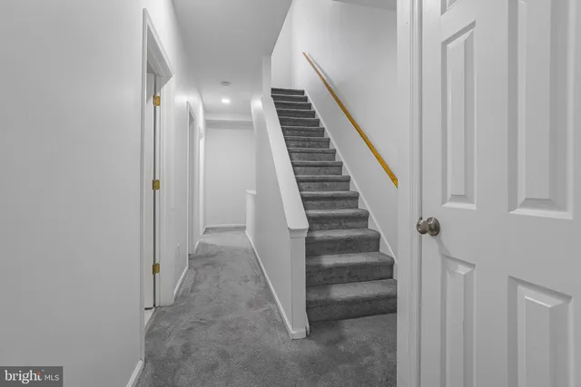 a view of a hallway with entryway