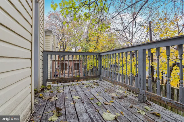 a view of a car parked in front of a building