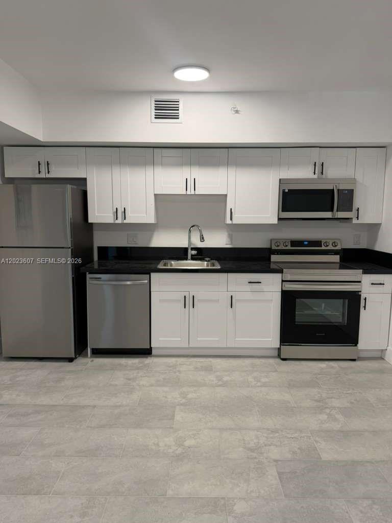 147 Northwest 59th Street, Unit 203 Miami, FL 33127 - Photo 5 of 29
