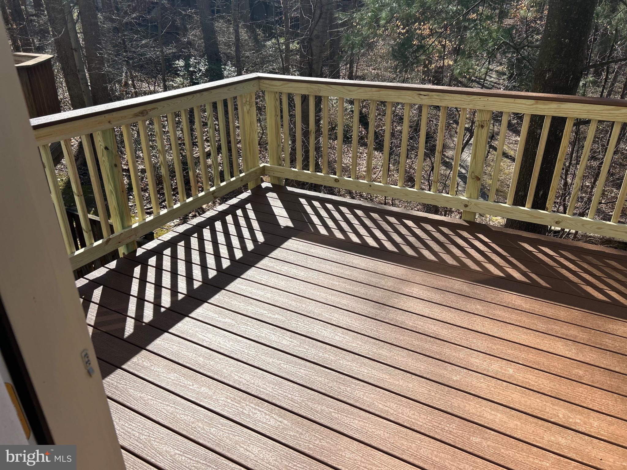 5833 Pin Oak Commons Court Burke, VA 22015 - Photo 8 of 15 a view of wooden deck