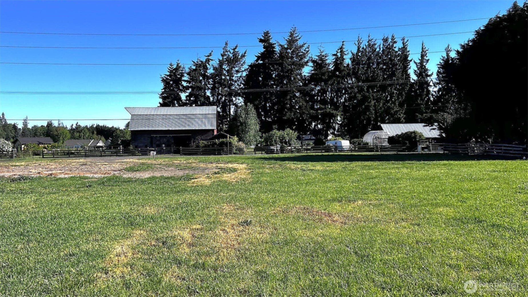 9999 Macleay Road Sequim, WA 98382 - Photo 15 of 16 a view of a house with a yard