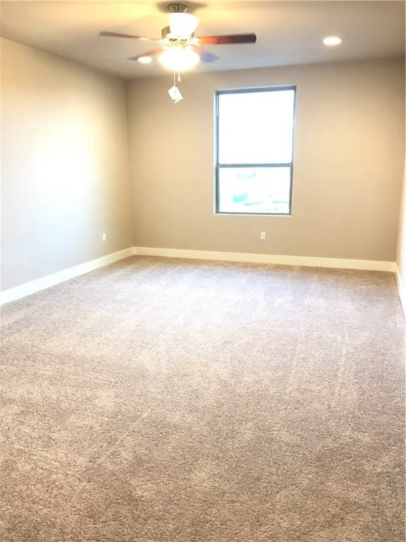 6814 East Riverside Drive, Unit 95 Austin, TX 78741 - Photo 11 of 23 an empty room with a window