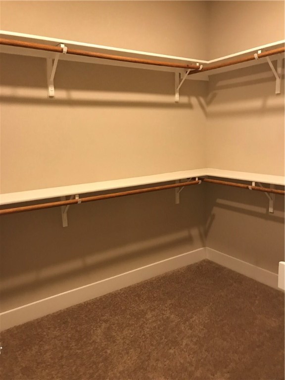 6814 East Riverside Drive, Unit 95 Austin, TX 78741 - Photo 14 of 23 a view of a room with an empty walk in closet
