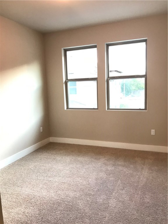 6814 East Riverside Drive, Unit 95 Austin, TX 78741 - Photo 10 of 23 an empty room with a window