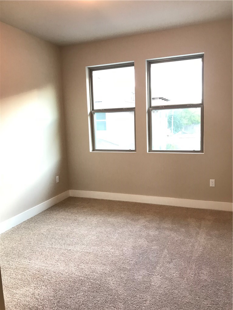 6814 East Riverside Drive, Unit 95 Austin, TX 78741 - Photo 10 of 23 an empty room with a window