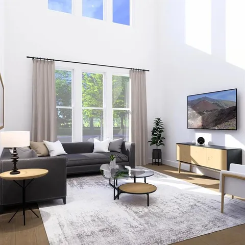 a view of a livingroom with furniture and window