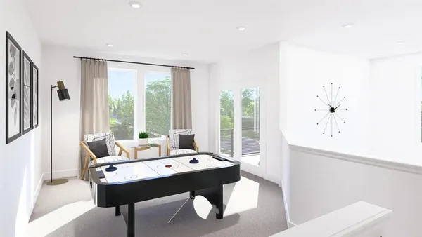 a view of a dining room with furniture and window