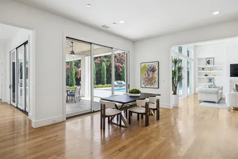 a view of a livingroom with furniture and wooden floor