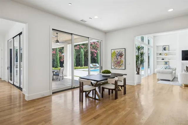 a view of a livingroom with furniture and wooden floor
