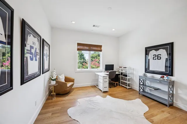 a living room with furniture window and table