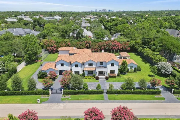 an aerial view of a house with a garden