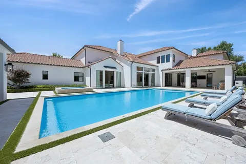 a house view with a garden space