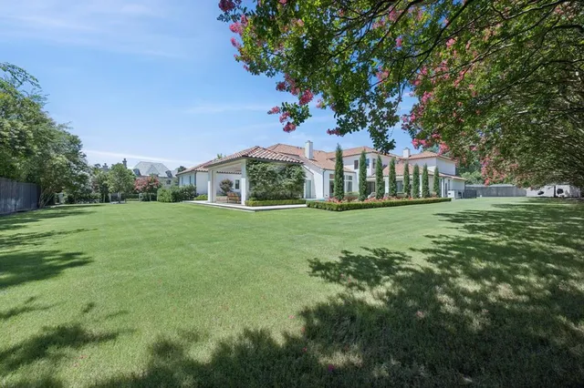 a view of a house with a big yard