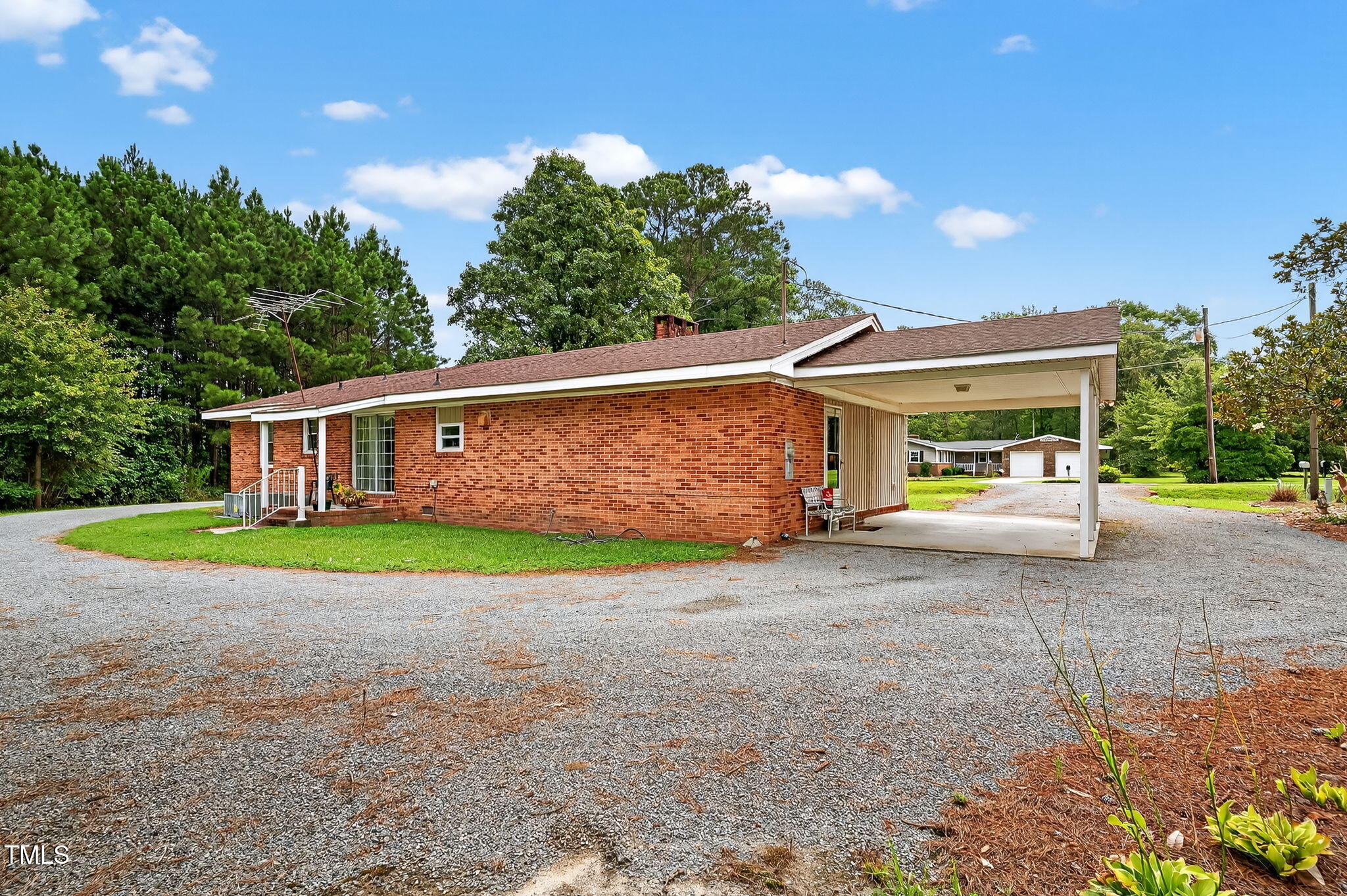 788 Gor An Farm Road Selma, NC 27576 - Photo 21 of 31 a view of a house with backyard and a tree