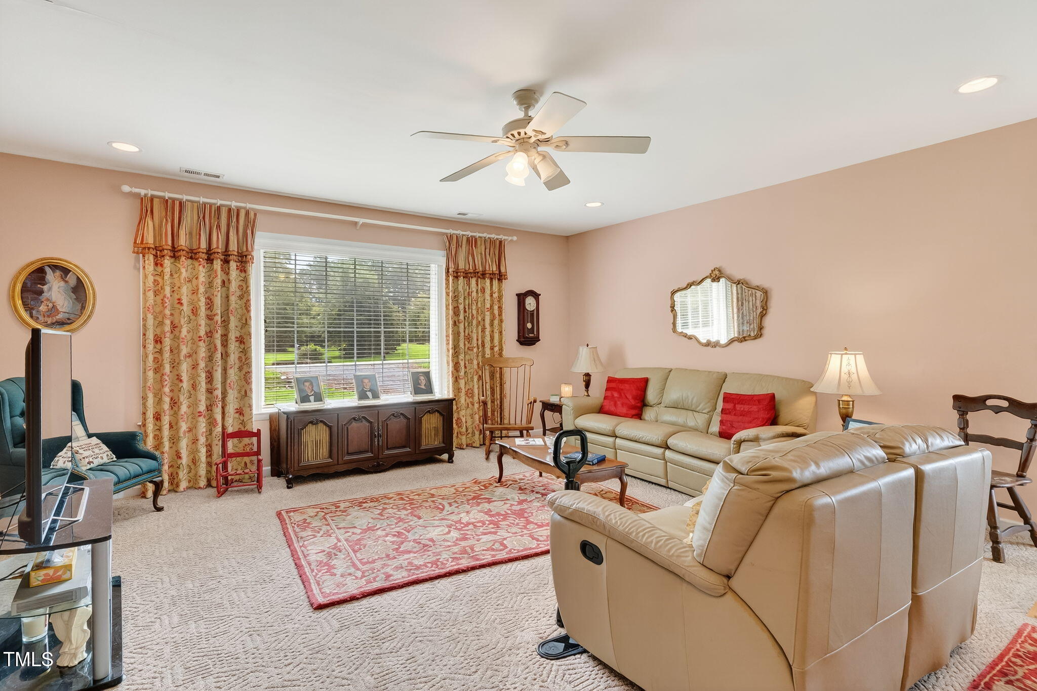 788 Gor An Farm Road Selma, NC 27576 - Photo 6 of 31 a living room with furniture and a large window