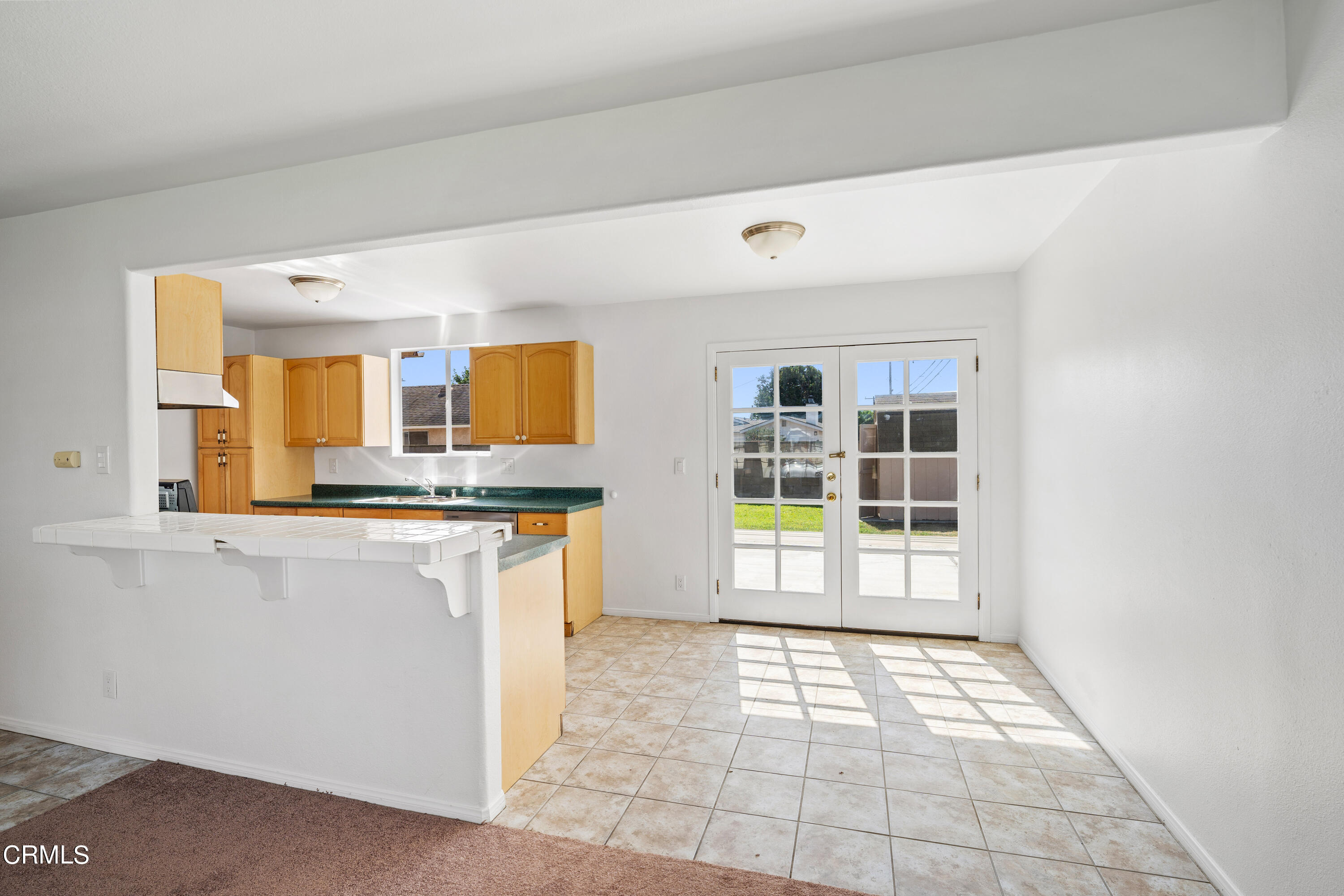 646 Pearson Road Port Hueneme, CA 93041 - Photo 11 of 19 a view of a kitchen with a sink and a large window