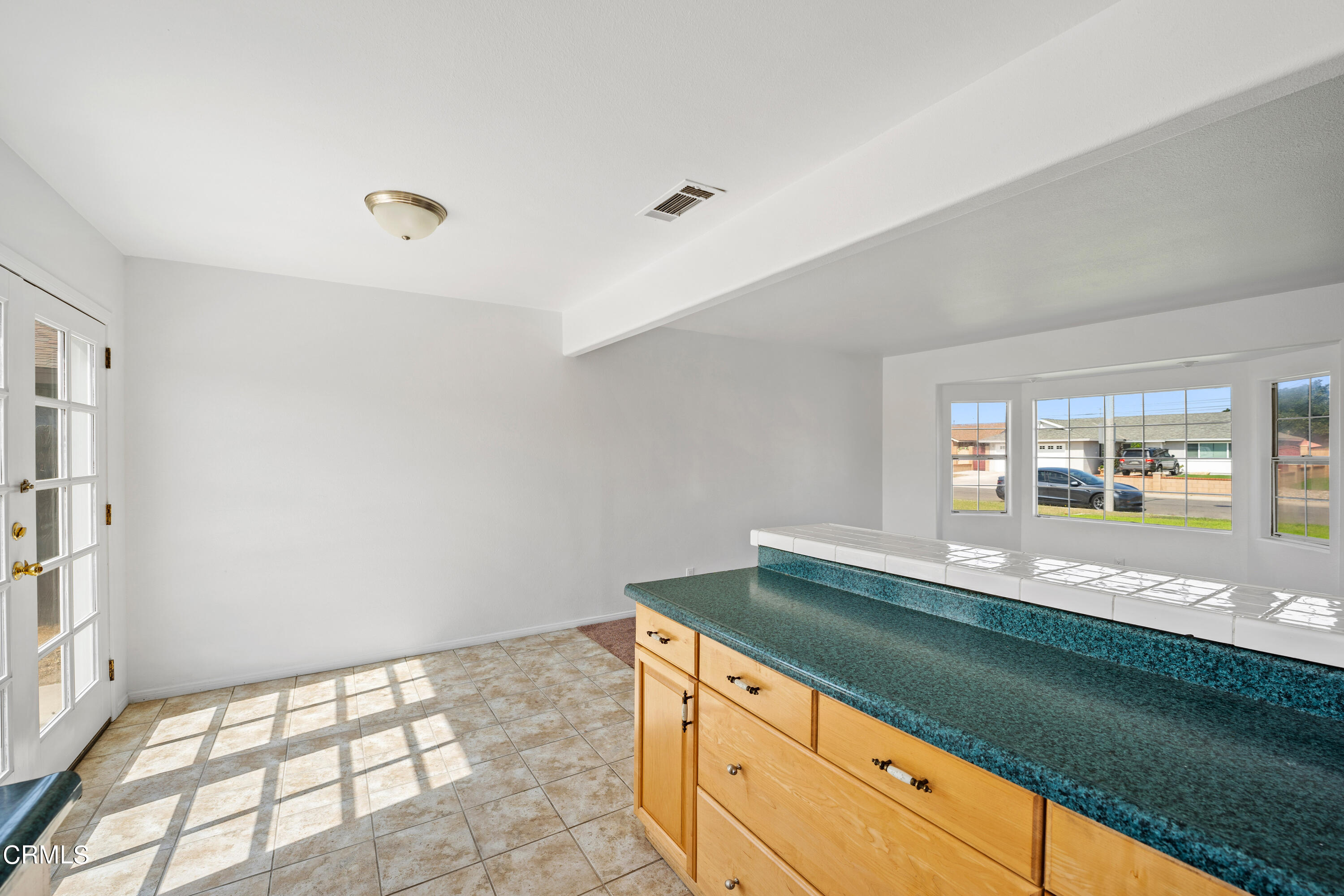 646 Pearson Road Port Hueneme, CA 93041 - Photo 15 of 19 a view of a sink and dishwasher with a large window