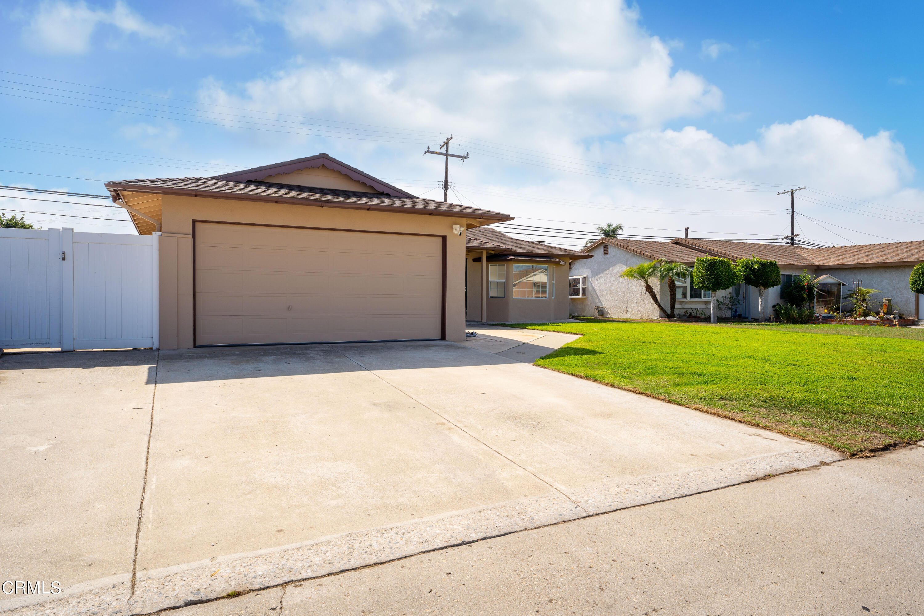646 Pearson Road Port Hueneme, CA 93041 - Photo 3 of 19 a front view of a house with yard and garage