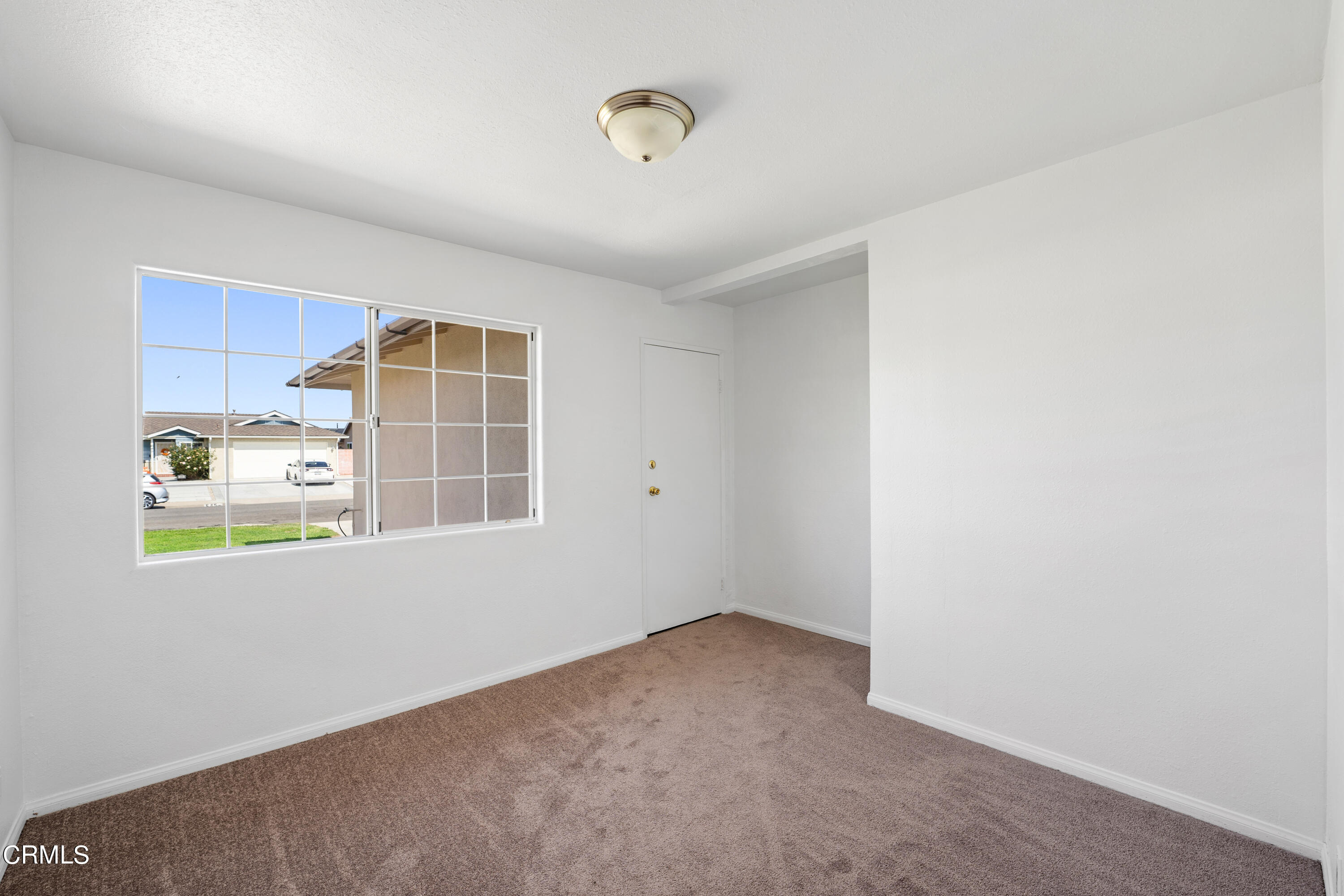 646 Pearson Road Port Hueneme, CA 93041 - Photo 7 of 19 a view of an empty room with a window