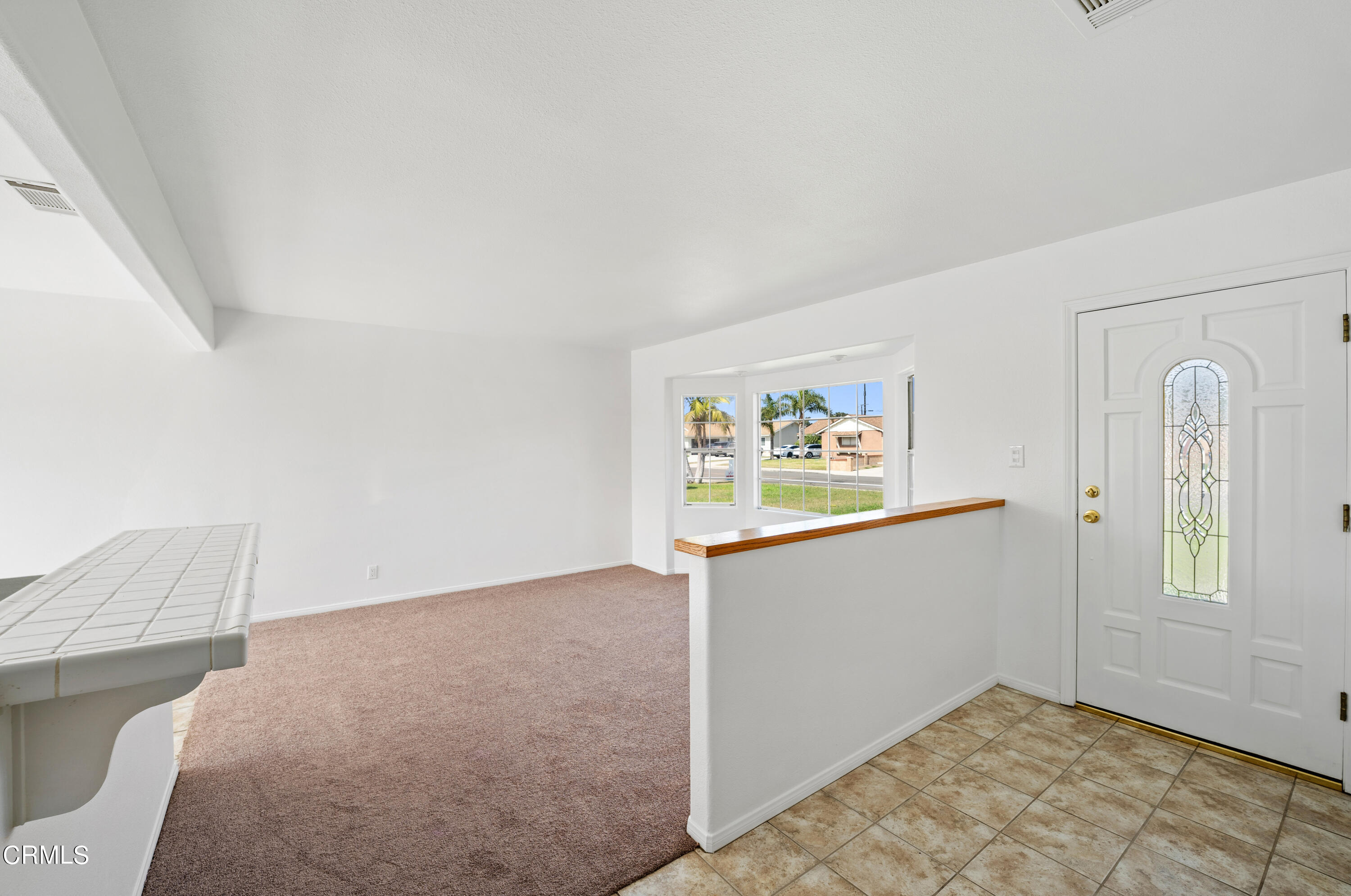 646 Pearson Road Port Hueneme, CA 93041 - Photo 8 of 19 a view of a bedroom with wooden floor and windows