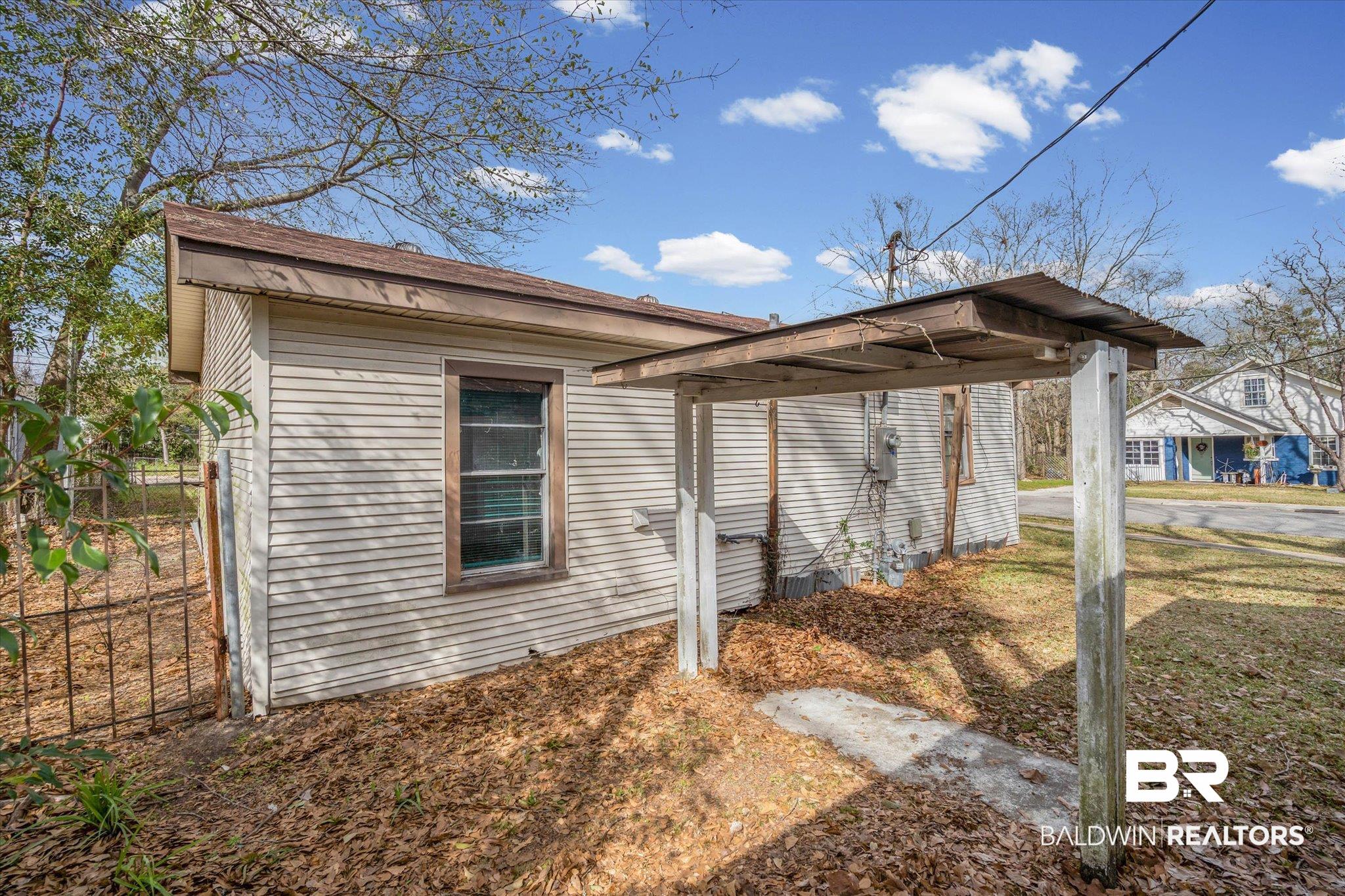 351 Kansas Street Mobile, AL 36611 - Photo 4 of 7 View of side of home