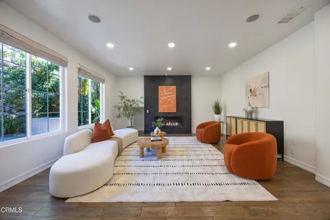 a bathroom with double sink and a mirror