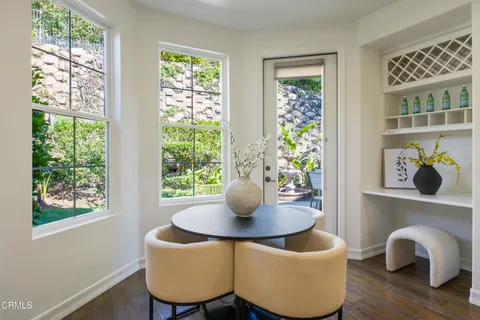a view of hallway with windows