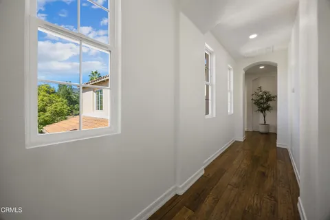 a bed room with a bed and a window