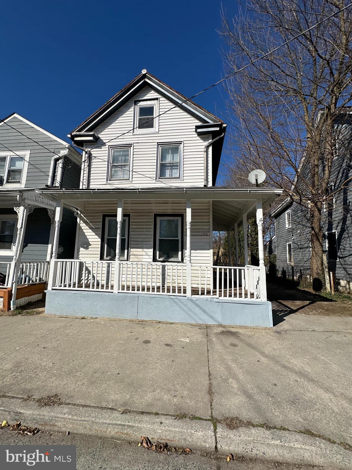 120 Thompson Street Salem, NJ 08079 - Photo 2 of 14 front view of a house with a yard