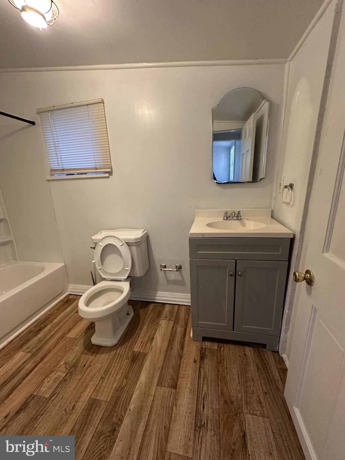 120 Thompson Street Salem, NJ 08079 - Photo 7 of 14 a bathroom with a sink and a mirror