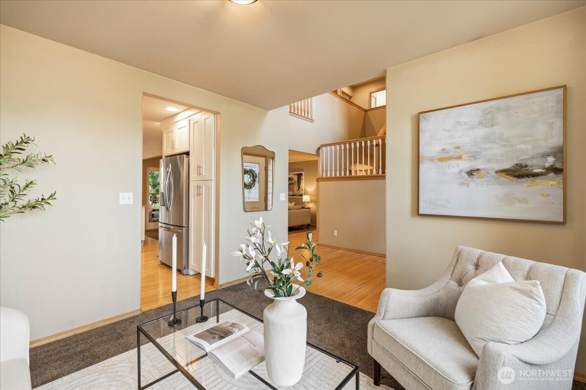 1218 231st Street Southeast Bothell, WA 98021 - Photo 4 of 40 a living room with furniture and wooden floor