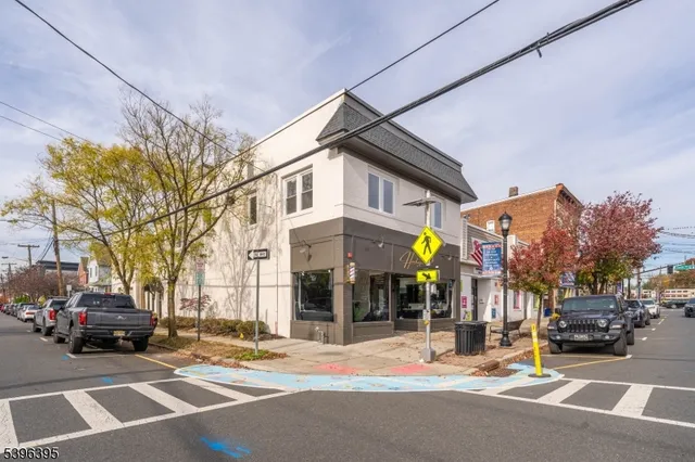 a view of a cars parked in front of a building