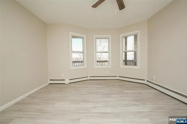 an empty room with windows