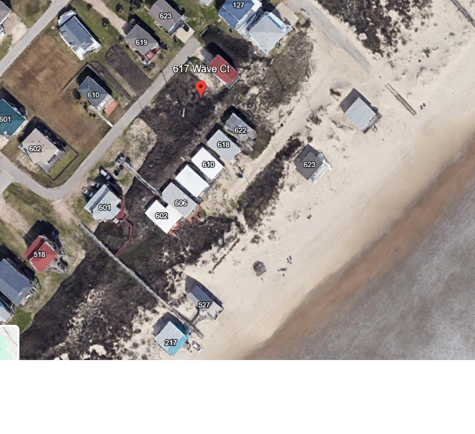 617 Wave Court Surfside Beach, TX 77541 - Photo 4 of 5 an aerial view of a house with a yard