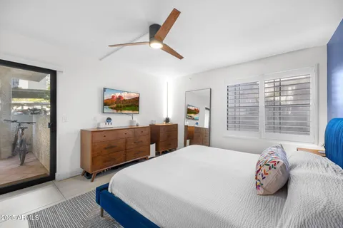 a bathroom with a double vanity sink mirror and