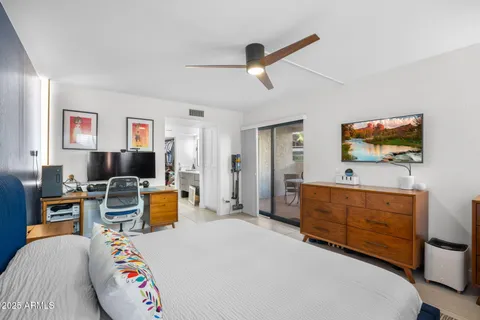 a bathroom with a shower and toilet