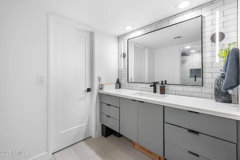 a view of a livingroom with furniture and a window