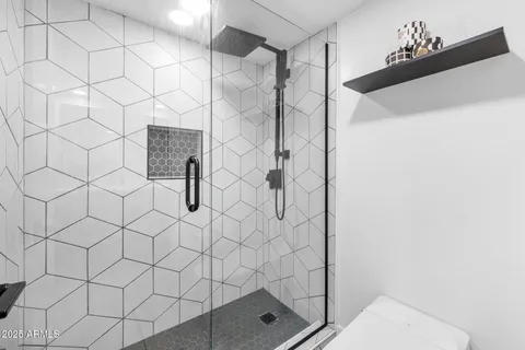 swimming pool view with a garden space