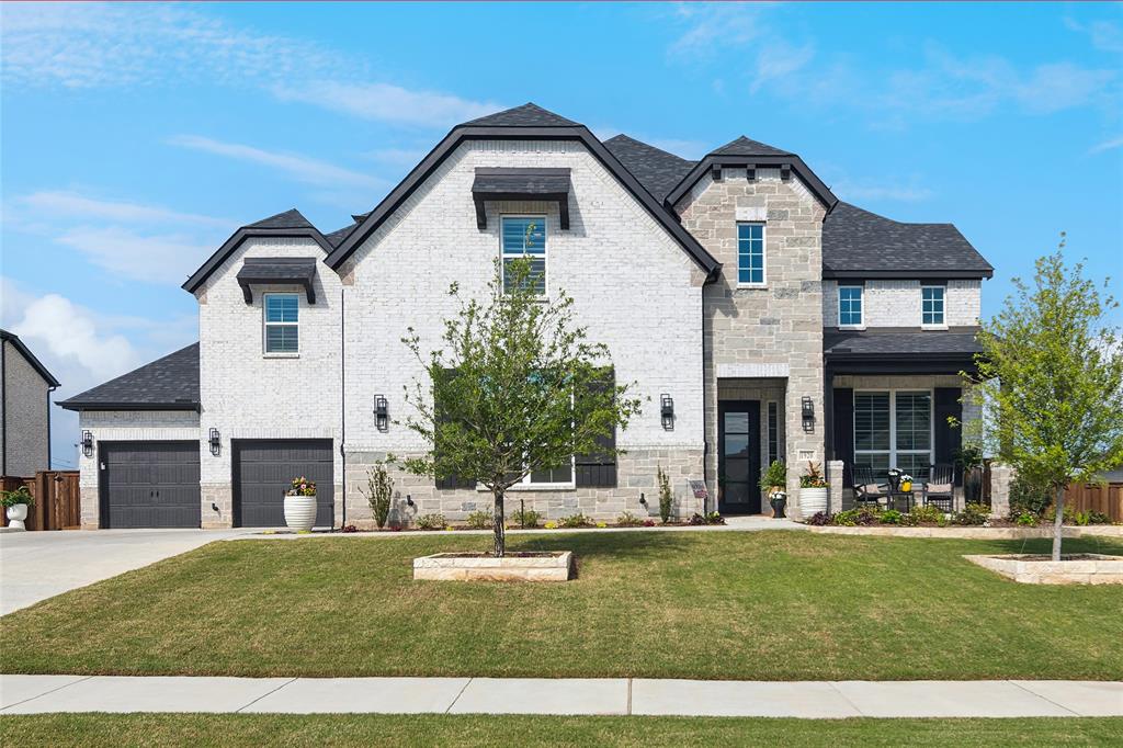 1920 Lotus Court Haslet, TX 76052 - Photo 4 of 40 Welcome Home! 5 bedrooms, 5 full, 2 half baths. 4 car garage. Resort style pool and backyard! Gorgeous move in ready home!