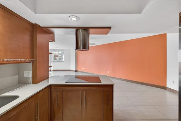 a utility room with closet dryer and washer