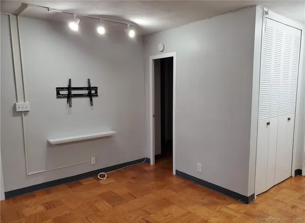 an entryway with a ceiling fan