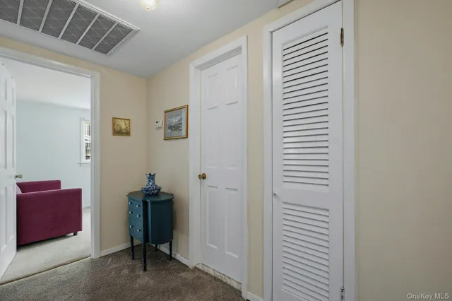 a view of a room with furniture