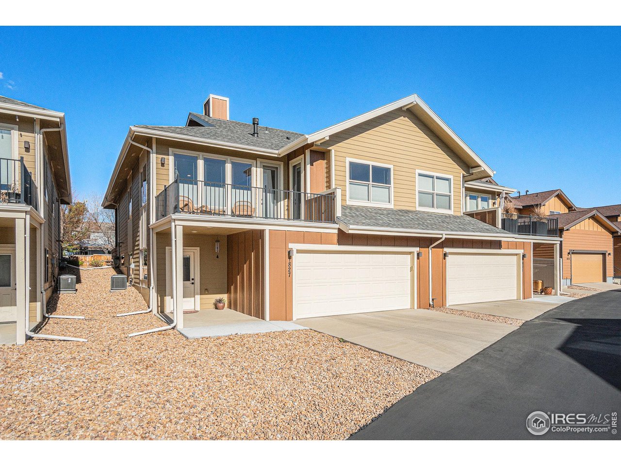1827 Fromme Prairie Way Fort Collins, CO 80526 - Photo 20 of 21 a front view of a house with a yard